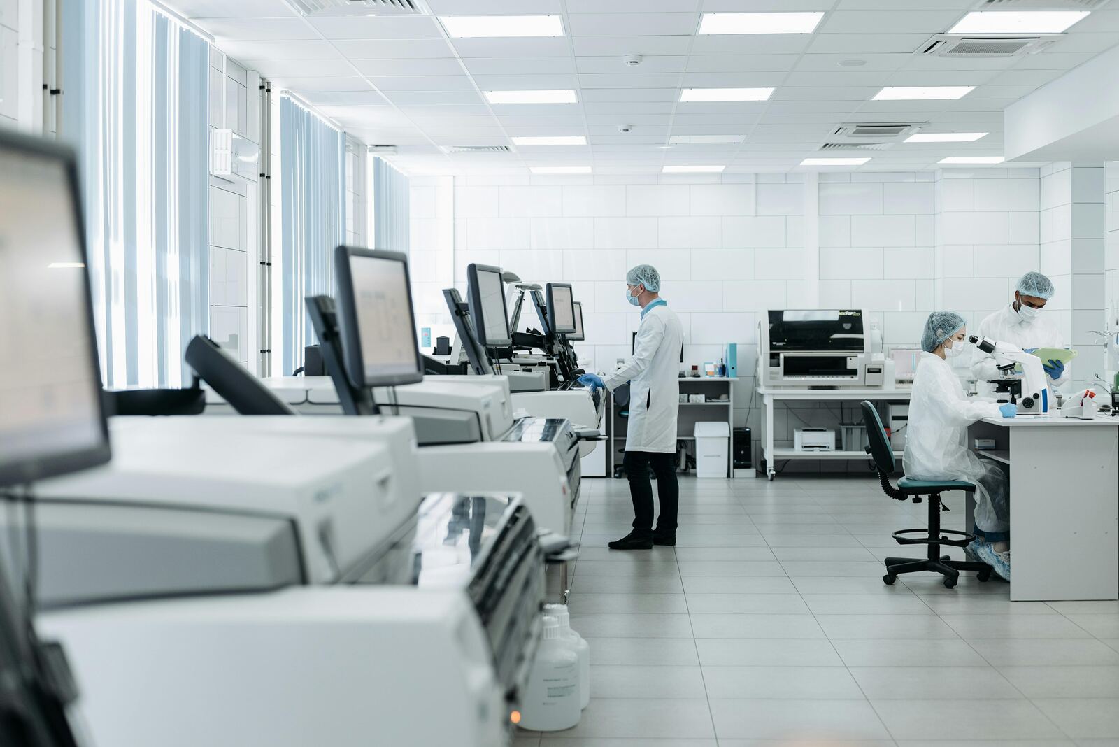 Scientists working in laboratory